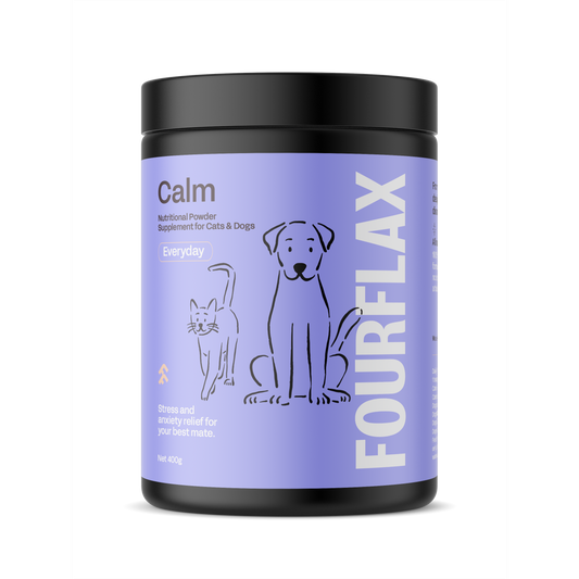 Black Fourflax Calm supplement jar with purple label, dog and cat illustrations, and "Stress and anxiety relief" text.