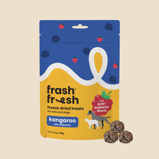 Frashfresh freeze-dried kangaroo treats for cats and dogs with antioxidants boost, next to three dark brown meatballs.