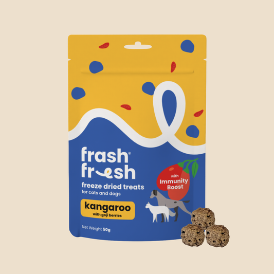 Frashfresh freeze-dried kangaroo treats for cats and dogs with immunity boost, next to three brown meatballs.