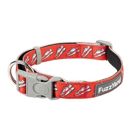 FuzzYard Fresh Kicks dog collar: red neoprene with white sneakers pattern, grey buckle, and metal D-ring.