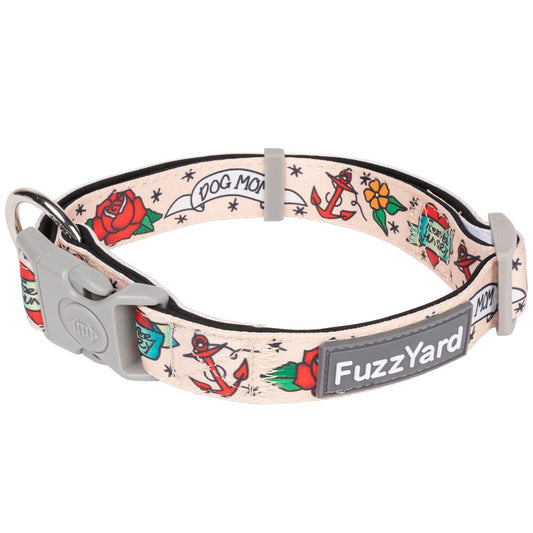 FuzzYard Dog Collar (Ink'd Up) with beige neoprene, tattoo-style anchors, roses, and "DOG MOM" text.
