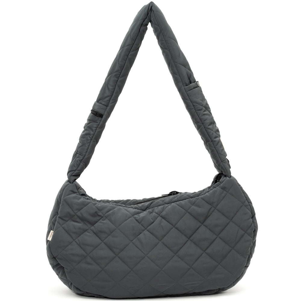 FuzzYard Life Quilted Sling Dog Carrier in slate grey, featuring a padded strap and minimalist design.