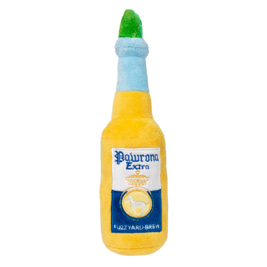 Yellow plush dog toy shaped like a beer bottle with "Pawrona Extra" label, blue neck, and green cap.