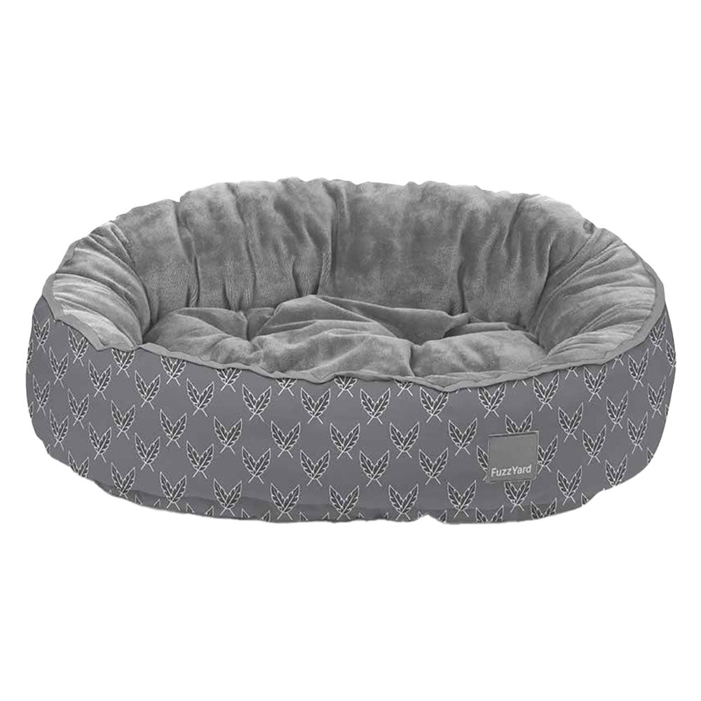 FuzzYard Reversible Dog Bed in Victorious, a grey bed with white feather print and velvety-soft grey interior.
