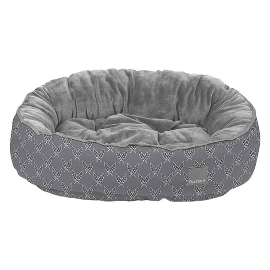 FuzzYard Reversible Dog Bed in Victorious, a grey bed with white feather print and velvety-soft grey interior.