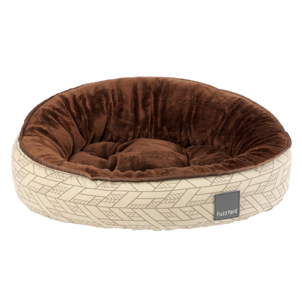FuzzYard Reversible Dog Bed (Wilshire) with a brown plush interior and beige geometric pattern exterior.