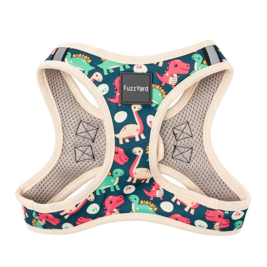 FuzzYard Step-In Dog Harness in Dinosaur Land, featuring colorful dinosaurs on dark teal polyester.
