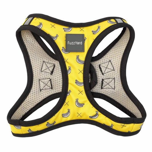 Yellow FuzzYard Step-In Dog Harness with banana print, black trim, and mesh lining.