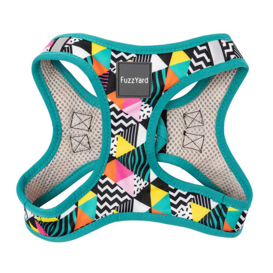 FuzzYard Step-In Dog Harness in "No Signal!" with vibrant geometric patterns, teal trim, and mesh lining.