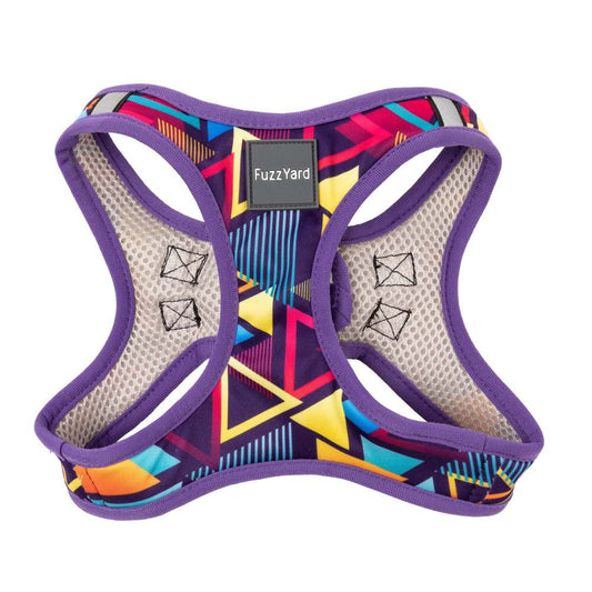 FuzzYard Step-In Dog Harness in Prism, featuring a vibrant geometric pattern, purple trim, and mesh lining.
