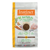 Instinct Be Natural Real Chicken & Brown Rice dry dog food bag with ingredients like chicken, carrots, and rice.