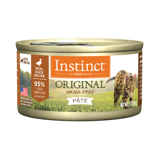 Instinct Original Grain-Free Real Duck Recipe Pate Cat Food in a 3 oz can with a cat in a field.