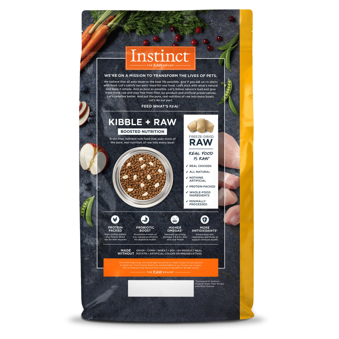 Instinct Raw Boost Grain-Free Chicken Dry Cat Food bag with raw ingredients and kibble visible.