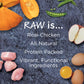 Raw chicken, pumpkin, peas, apple, and eggs on a dark background with "RAW is..." text.