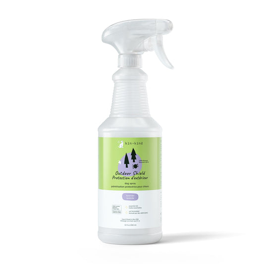 Kin+Kind Outdoor Shield dog spray, lavender scent, in a white plastic spray bottle with green label.