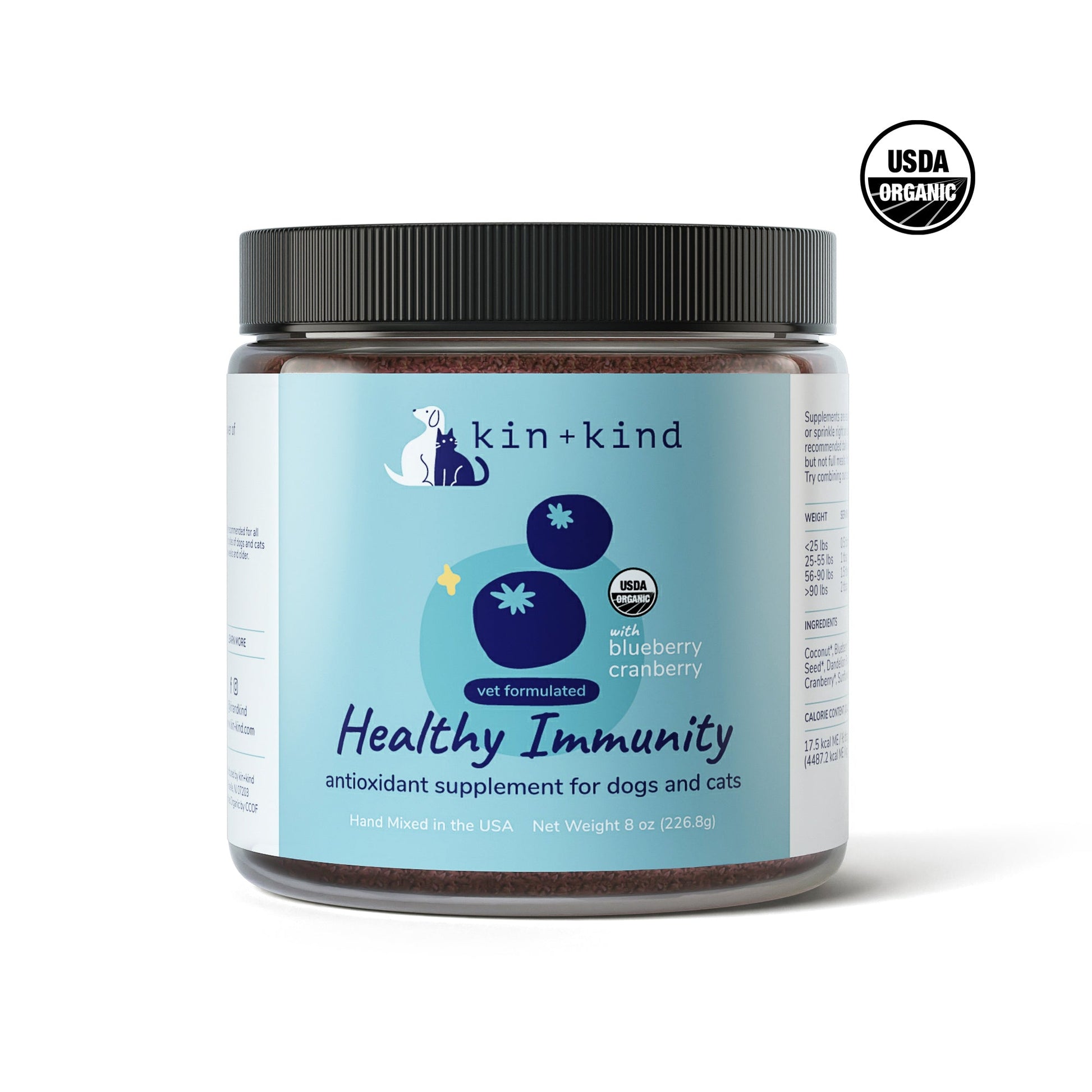 Kin+Kind Healthy Immunity supplement for dogs and cats, 8 oz jar with blue label, blueberries, and USDA Organic seal.