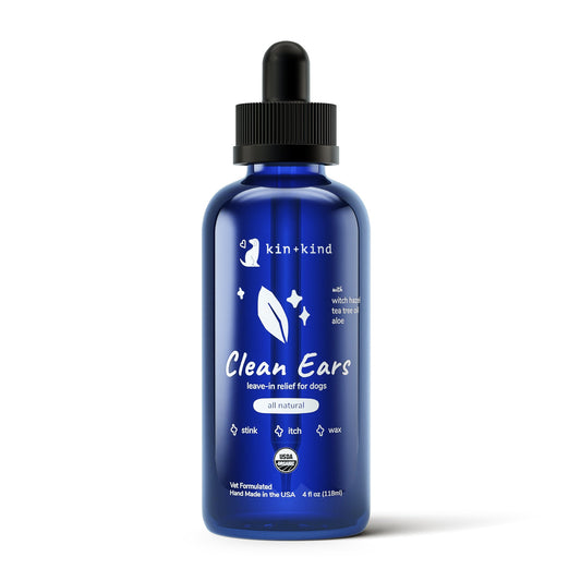 Kin+Kind Organic Clean Ears leave-in relief for dogs in a blue glass dropper bottle.