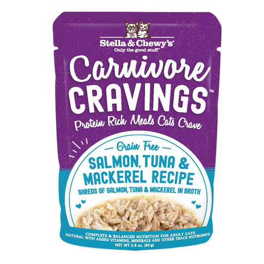 Stella & Chewy's purple and blue pouch of Carnivore Cravings Salmon, Tuna & Mackerel cat food with shredded fish.