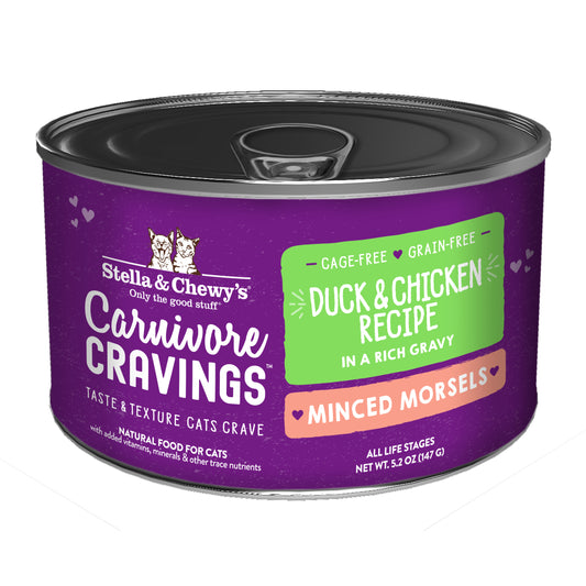 Stella & Chewy's Carnivore Cravings Minced Morsels cat food can, purple with green and orange labels.