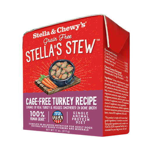 Red Stella & Chewy's Stella's Stew Cage-Free Turkey Recipe wet dog food carton with a bowl of stew and carrots.