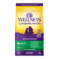 Wellness Complete Health Lamb & Barley Recipe Dry Dog Food bag with purple and yellow sunset design.