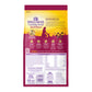 Wellness Complete Health Small Breed Senior dry dog food bag with purple and gold accents, showing kibble.