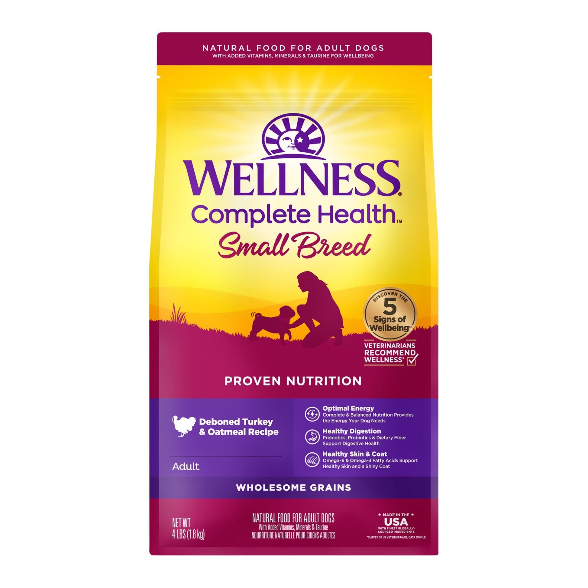 Wellness Complete Health Small Breed Turkey & Oatmeal dry dog food bag with purple and yellow sunset design.