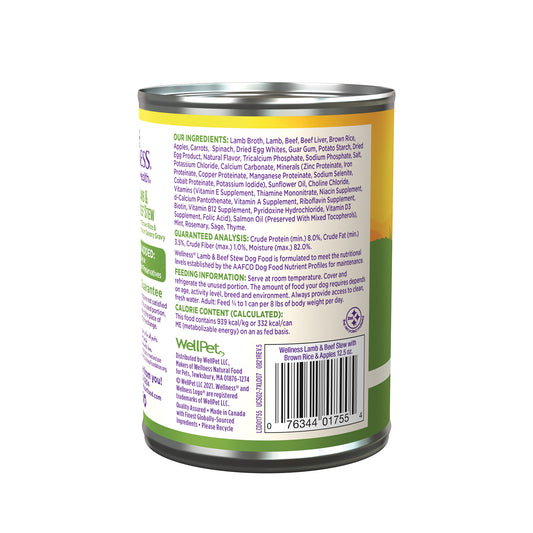 Wellness Stew Lamb & Beef Wet Dog Food 12.5oz can with brown rice and apples, green and purple label.