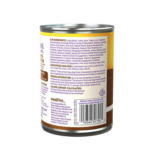 Wellness Stew Turkey & Duck Wet Dog Food 12.5oz can with purple and orange label, showing ingredients and barcode.