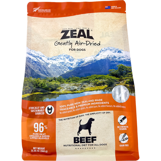 Zeal Air Dried Dry Dog Food, Beef flavor, in an orange and beige pouch with a New Zealand landscape.