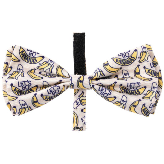 Polyester FuzzYard "Go Bananas" bowtie for pets, featuring yellow bananas and "Let's Go Bananas" text on a cream background, with a black velcro loop.