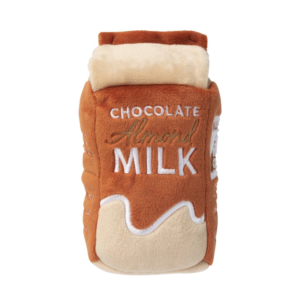 FuzzYard Chocolate Almond Milk plush dog toy, brown and cream, with "Chocolate Almond Milk" embroidered.