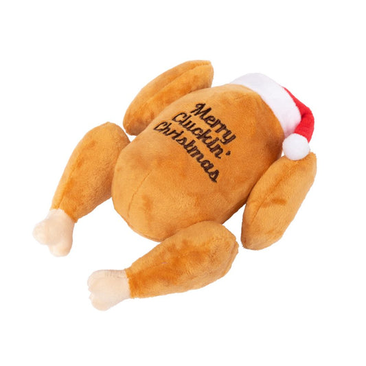 Plush roasted turkey dog toy with "Merry Cluckin' Christmas" embroidery and a red Santa hat.