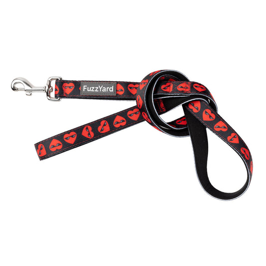 FuzzYard Heart Break dog lead: black neoprene with red heart-shaped lips, silver steel clasp.
