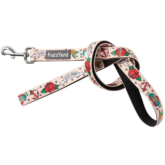 FuzzYard Dog Leash (Ink'd Up) in beige neoprene with red roses, anchors, and "DOG MOM" tattoos.