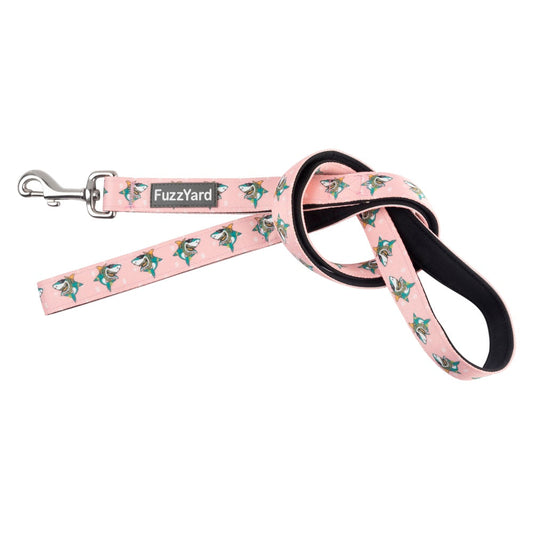 Pink FuzzYard dog leash with "LL Cool Jaw$" shark print, black padded handle, and silver metal clasp.