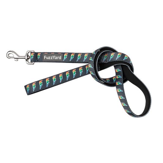 FuzzYard Volt dog leash: black neoprene with colorful lightning bolts, silver swivel clasp, and knotted loop handle.
