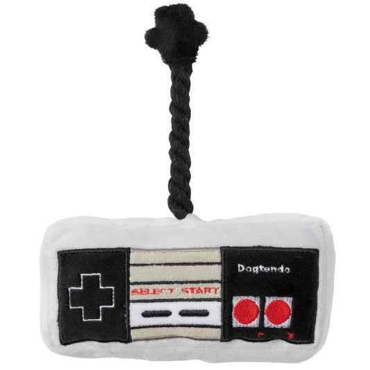 White plush Dogtendo retro controller dog toy with black cord and red buttons.