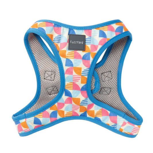 FuzzYard Fresh Zest step-in dog harness with a colorful 70s geometric pattern, blue trim, and mesh lining.