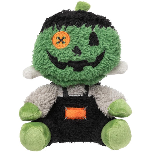 Fluffy green Frankenstein pumpkin dog toy with black hair, orange button eye, and black overalls.