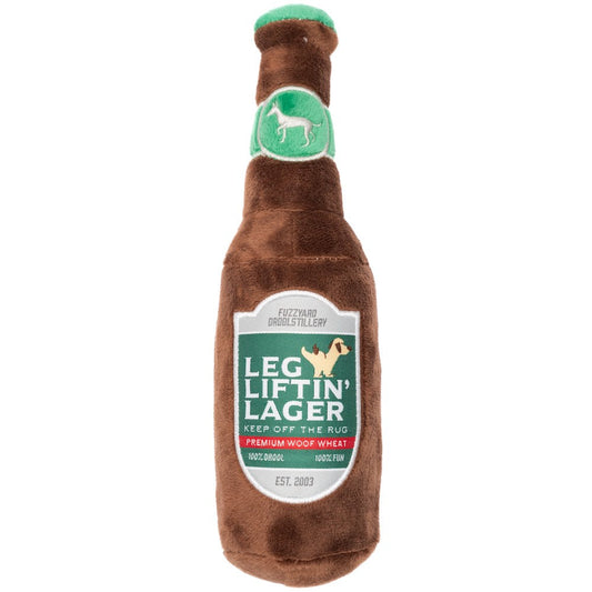 FuzzYard Leg Liftin' Lager plush dog toy, a brown beer bottle with green cap and label featuring a peeing dog.