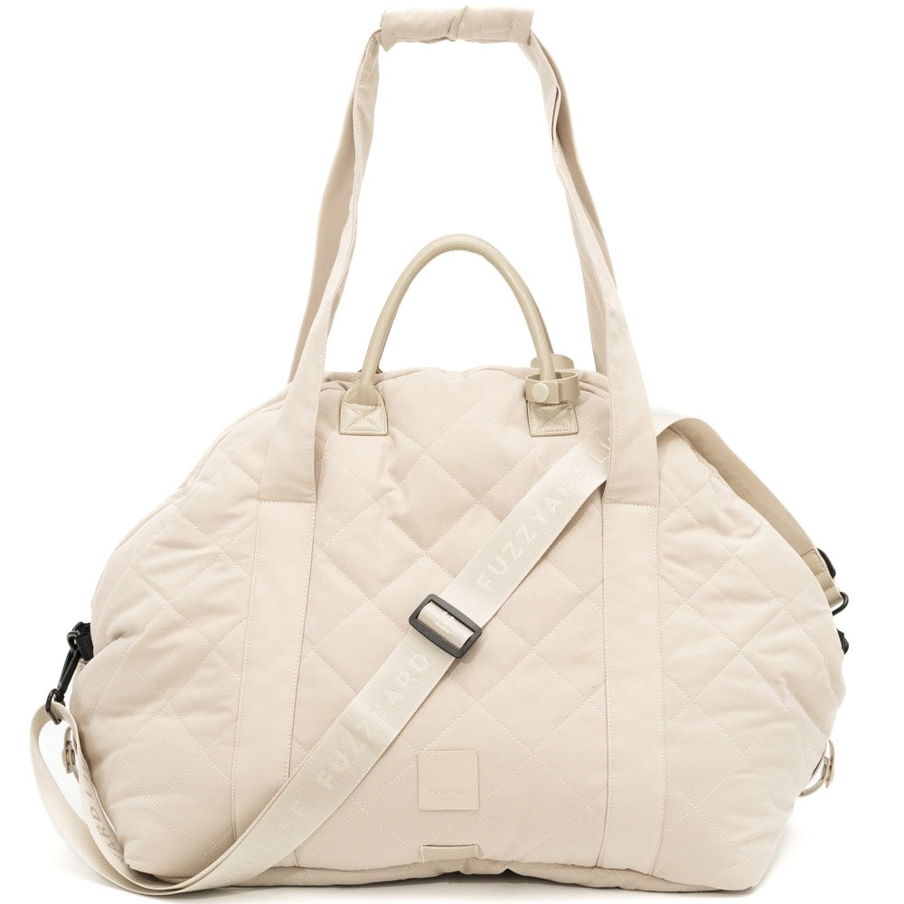 Sandstone FuzzYard Life quilted multipurpose pet carrier and car seat with adjustable straps.