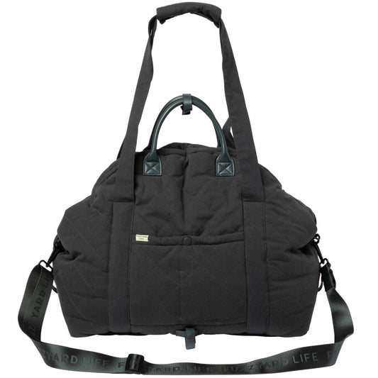 FuzzYard Life Slate Grey quilted multipurpose pet carrier, car seat, and bed with shoulder strap.