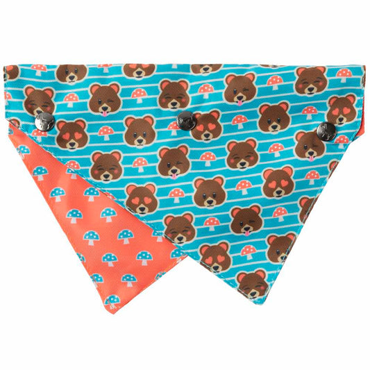 Reversible FuzzYard Pet Bandana with blue stripes and bear faces on one side, orange with blue mushrooms on the other.