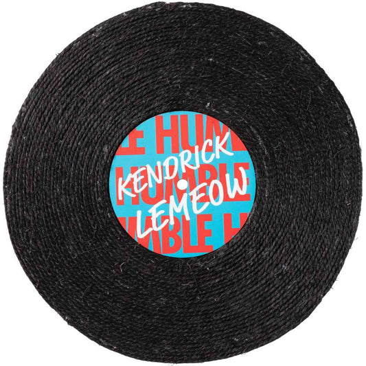 Black sisal rope cat scratcher shaped like a record, with a blue and red "Kendrick Lemeow" label.