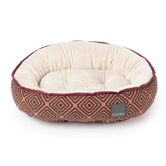 FuzzYard Reversible Dog Bed in Barcelona Maroon with aztec diamond pattern and velvety-soft cream interior.