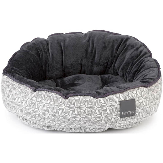 FuzzYard Reversible Dog Bed (Fandango) with grey plush interior and white leafy print exterior.