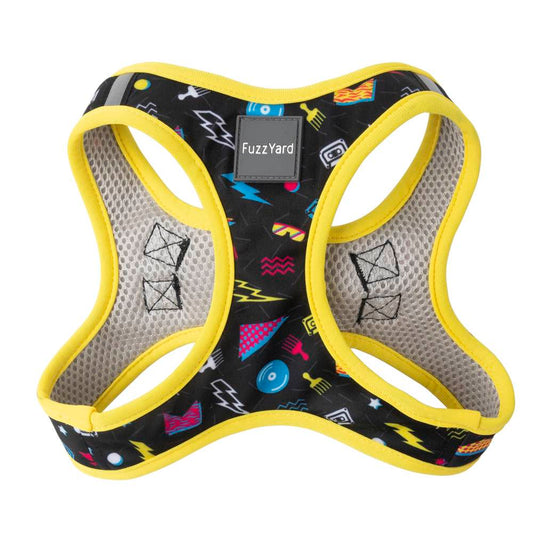 FuzzYard Bel Air step-in dog harness: black fabric with colorful retro patterns, yellow trim, and mesh.