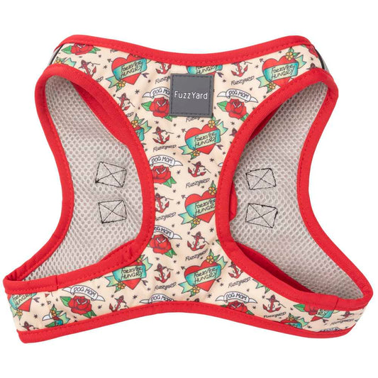 FuzzYard Step-In Dog Harness (Ink'd Up) with tattoo-style hearts, roses, and anchors on a cream polyester fabric, trimmed in red.
