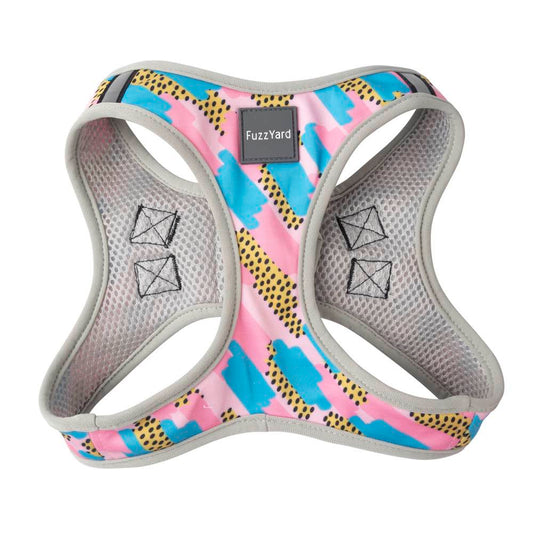 FuzzYard Jiggy step-in dog harness with pink, blue, and yellow abstract print, grey mesh lining.